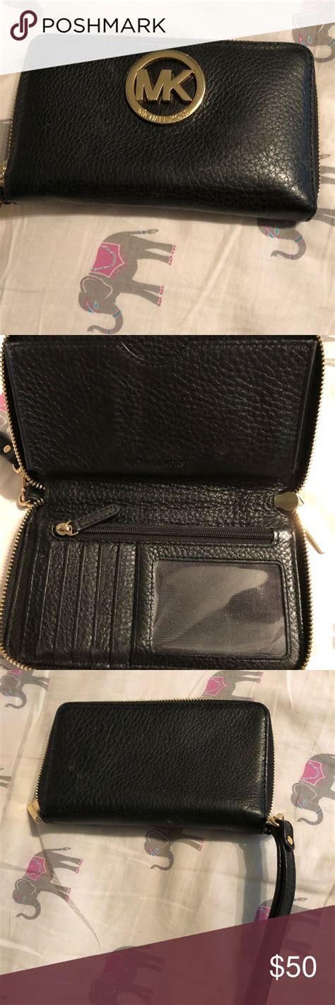 black shiny michael kors bag|michael kors black wristlets.